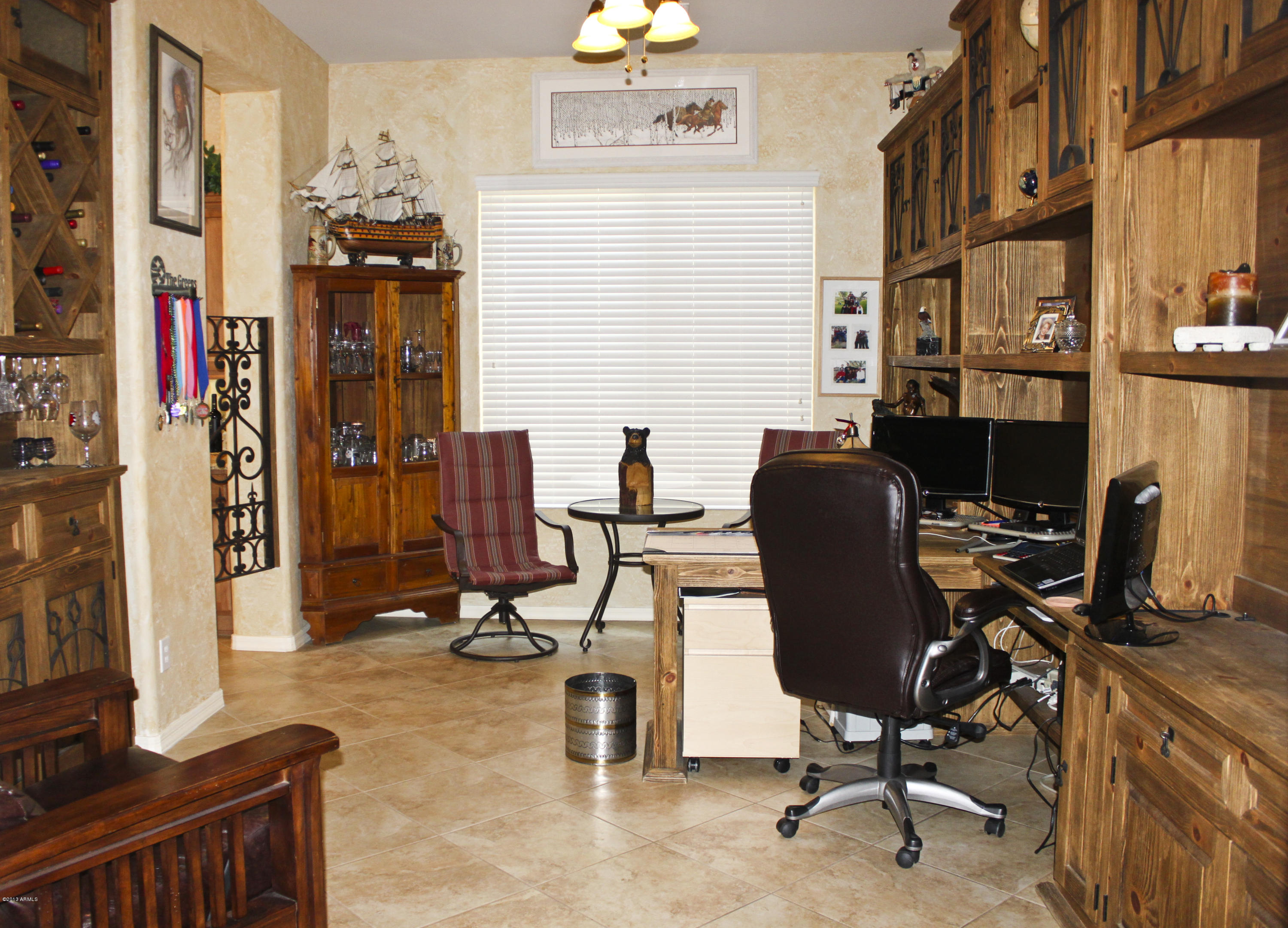1928 West Peak View Road Phoenix, AZ 85085 - Photo 13 of 35 a view of a workspace with furniture