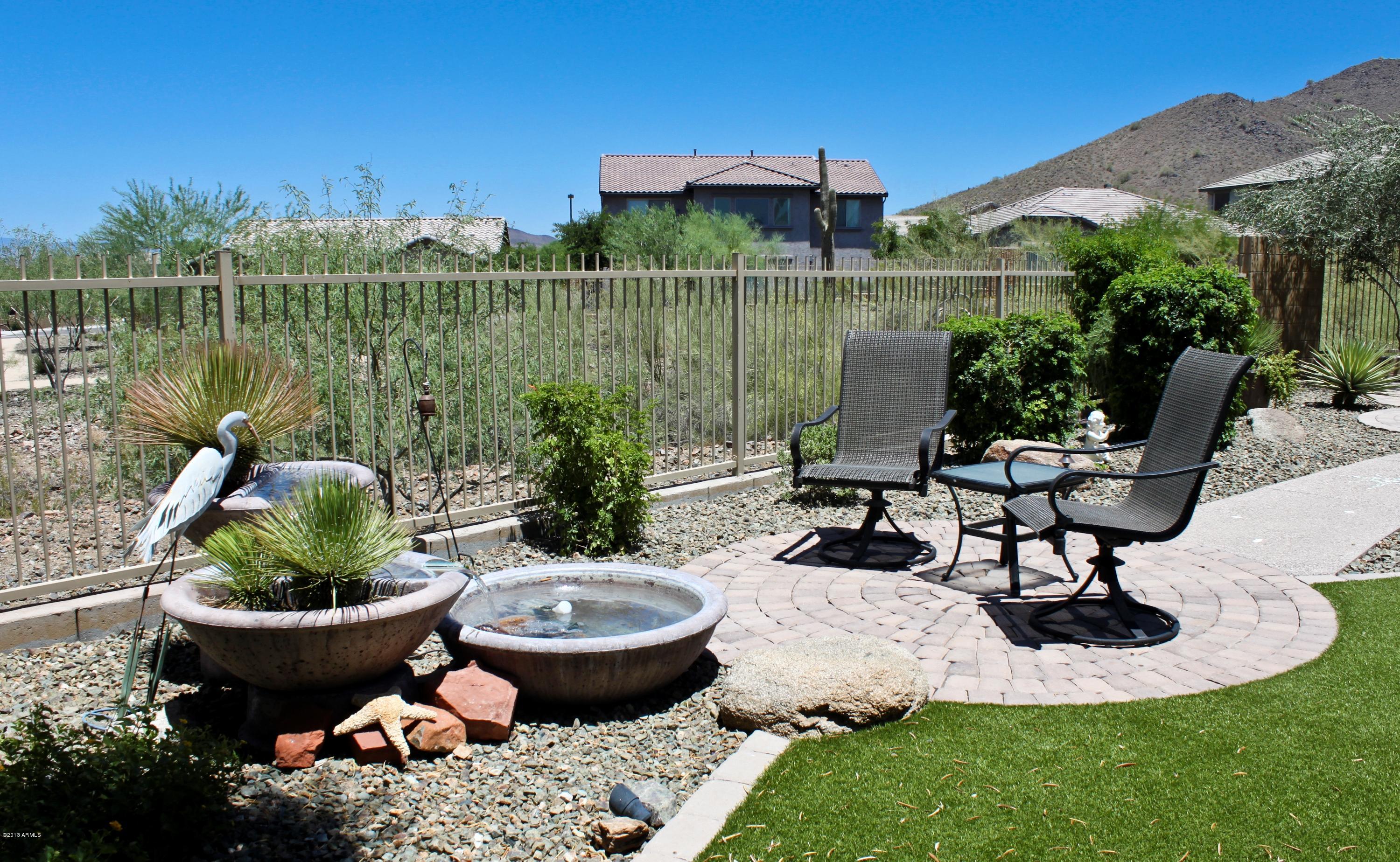 1928 West Peak View Road Phoenix, AZ 85085 - Photo 2 of 35 Sitting Area with Water Fountain