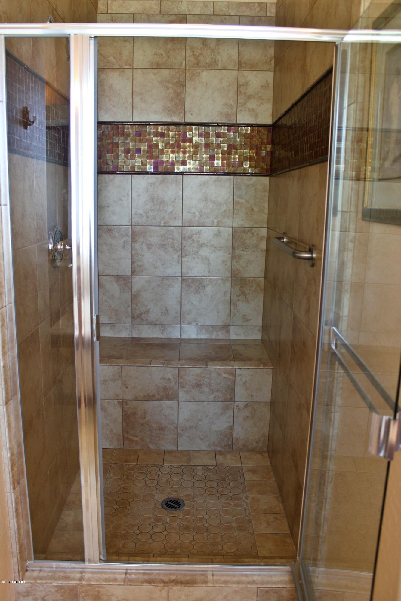 1928 West Peak View Road Phoenix, AZ 85085 - Photo 31 of 35 a bathroom with a shower