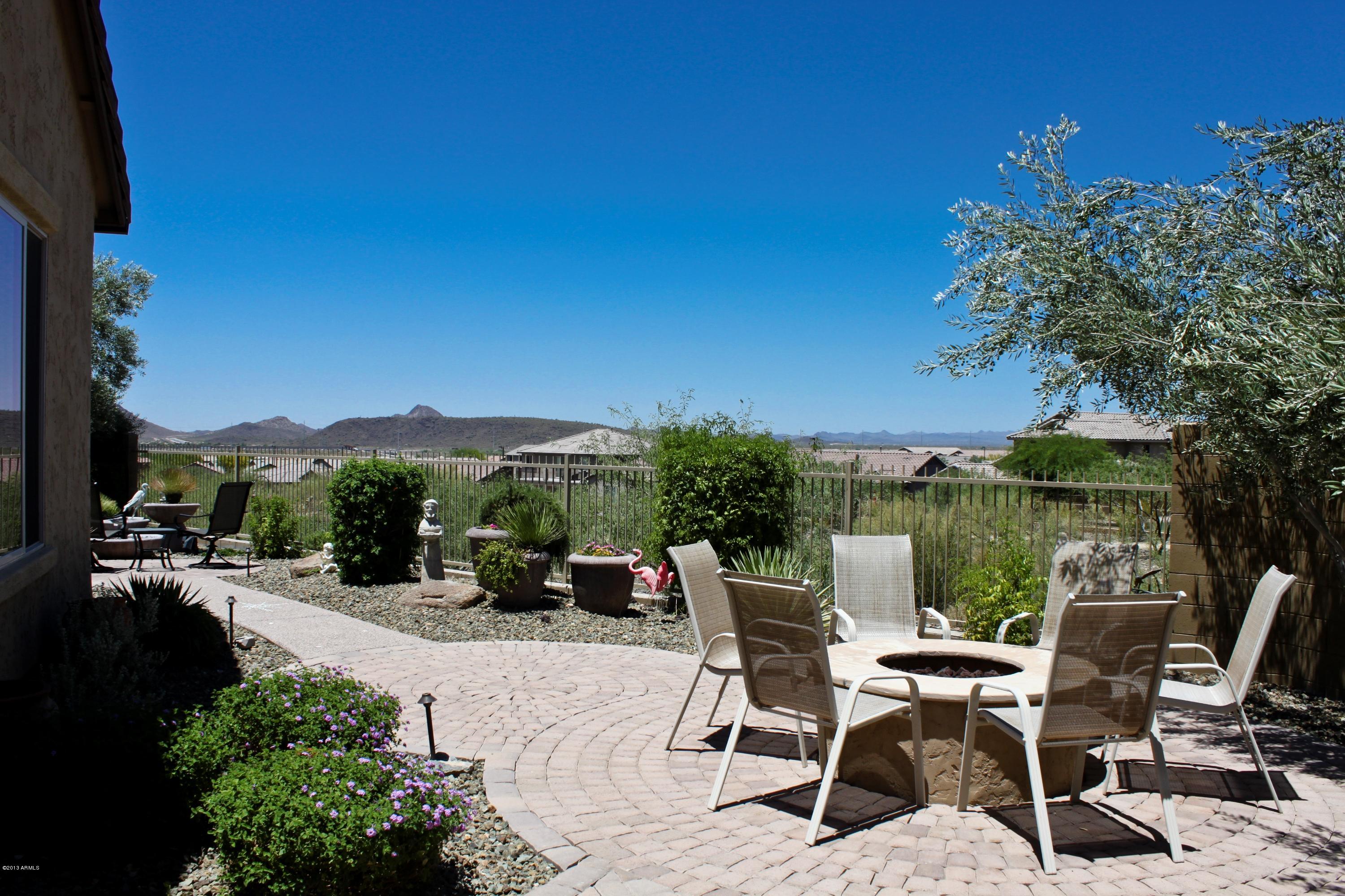 1928 West Peak View Road Phoenix, AZ 85085 - Photo 4 of 35 a view of a terrace with sitting area