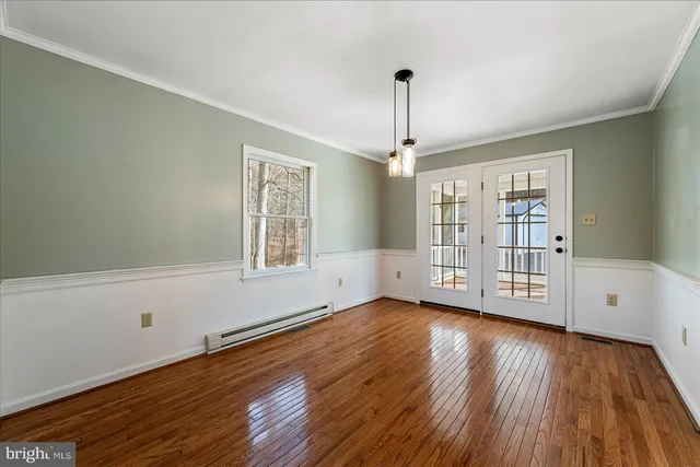 a kitchen with stainless steel appliances a refrigerator sink and cabinets