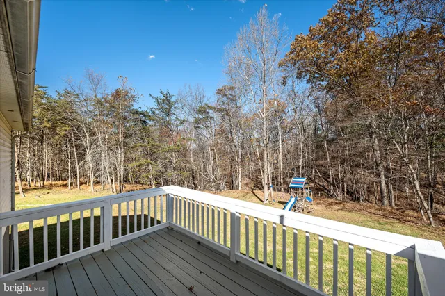 an aerial view of residential house and outdoor space