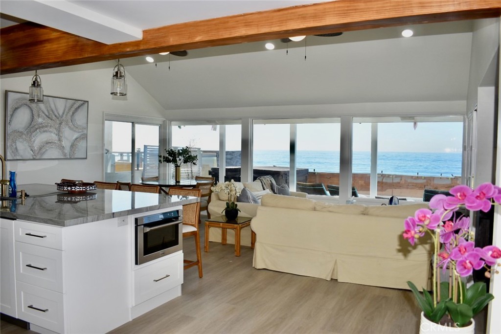 35605 Beach Road Dana Point, CA 92624 - Photo 18 of 61 a view of living room with furniture and large windows