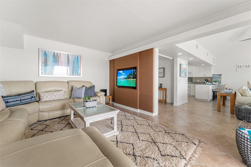 35605 Beach Road Dana Point, CA 92624 - Photo 24 of 61 a living room with furniture and a flat screen tv