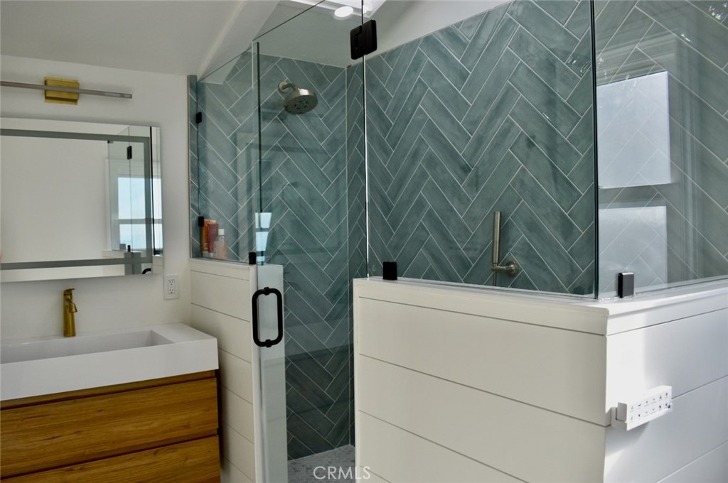35605 Beach Road Dana Point, CA 92624 - Photo 36 of 61 a bathroom with a shower and a sink