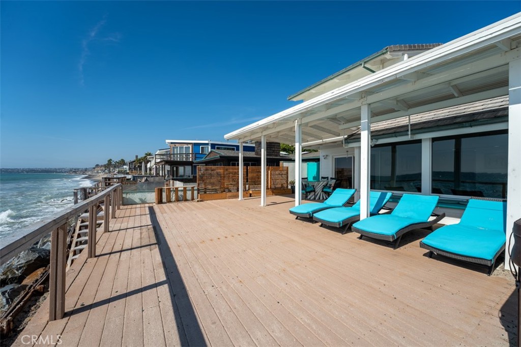 35605 Beach Road Dana Point, CA 92624 - Photo 48 of 61 a view of a house with lounge chair and floor to ceiling window