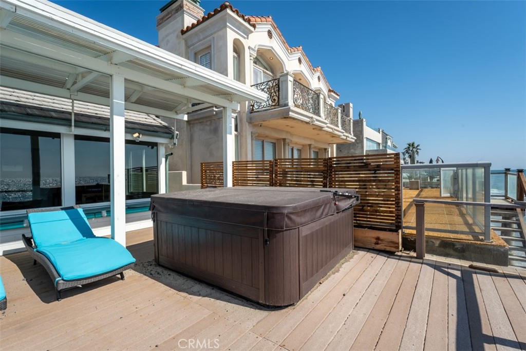 35605 Beach Road Dana Point, CA 92624 - Photo 52 of 61 a view of a rooftop deck with couch and chairs