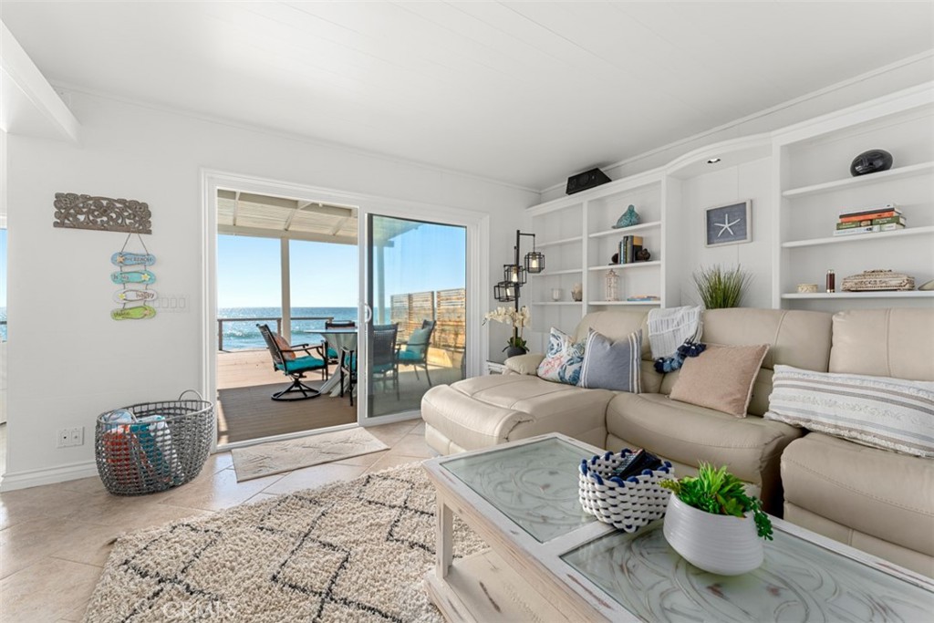 35605 Beach Road Dana Point, CA 92624 - Photo 9 of 61 a living room with furniture and a large window