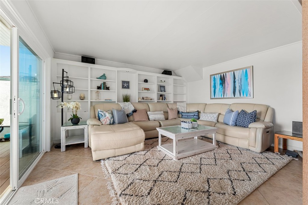 35605 Beach Road Dana Point, CA 92624 - Photo 10 of 61 a living room with furniture and a rug