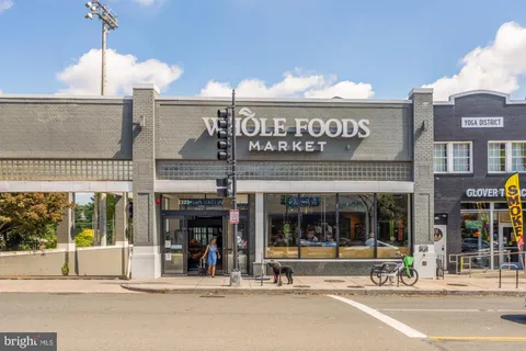 a view of a building with a street