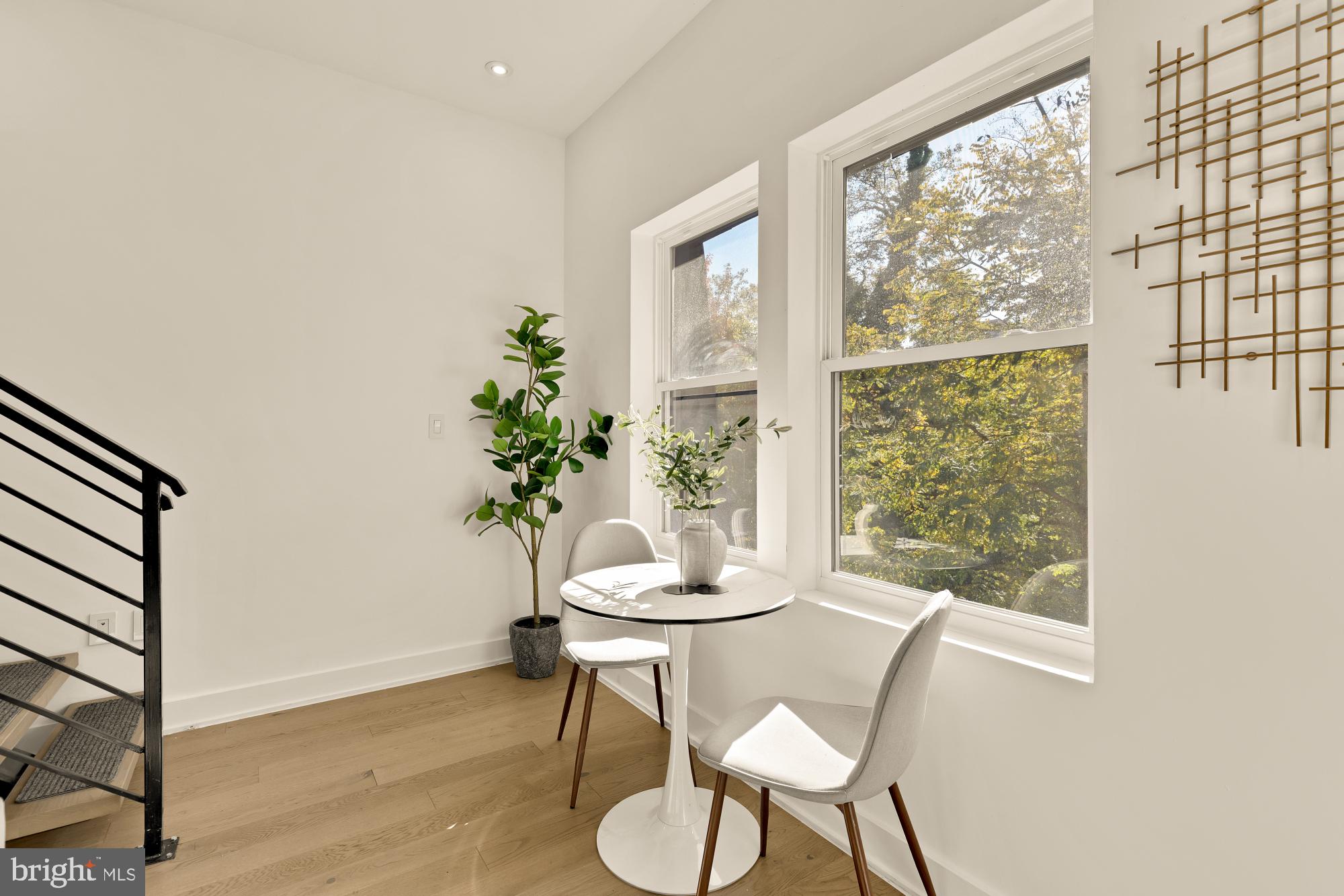 4017 Davis Place Northwest, Unit 8 Washington, DC 20007 - Photo 4 of 28 a view of a dining room with furniture window and outside view
