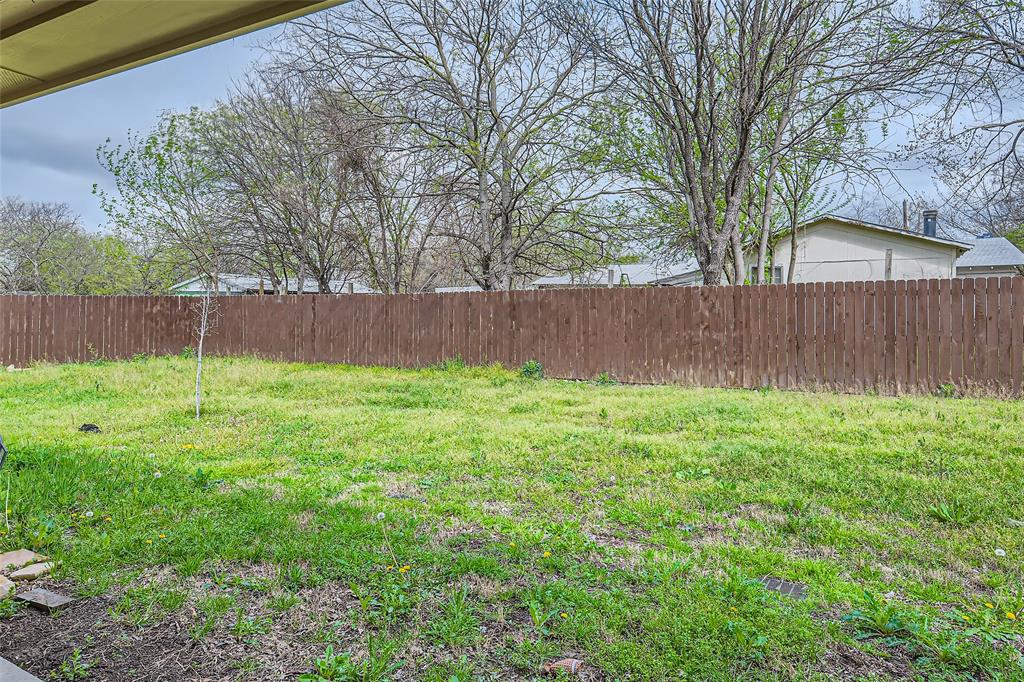 204 West Patton Street Alvarado, TX 76009 - Photo 14 of 17 a view of a backyard