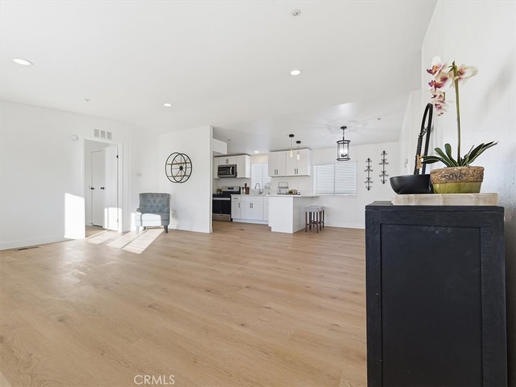 11878 Pacific Road Phelan, CA 92371 - Photo 15 of 50 a view of kitchen and living room