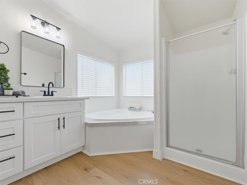 11878 Pacific Road Phelan, CA 92371 - Photo 25 of 50 a bathroom with a double vanity sink mirror and