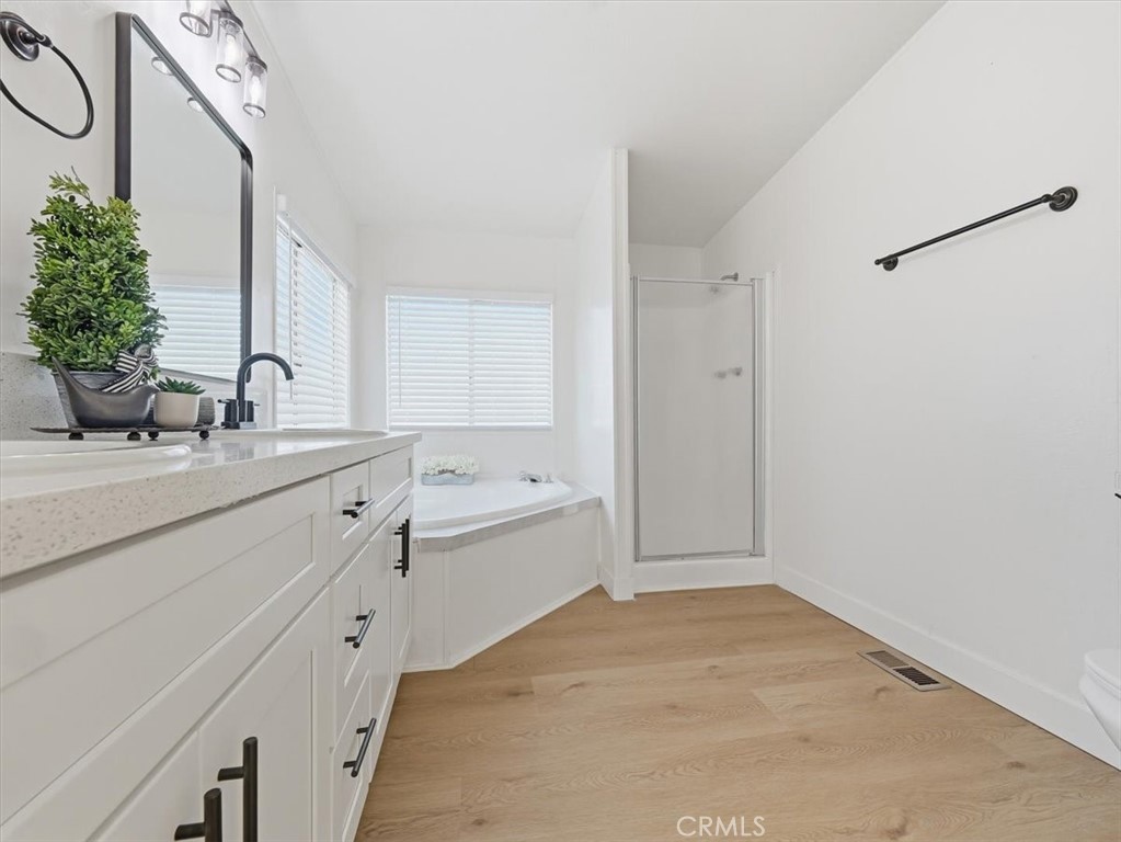11878 Pacific Road Phelan, CA 92371 - Photo 26 of 50 a bathroom with a sink and a mirror