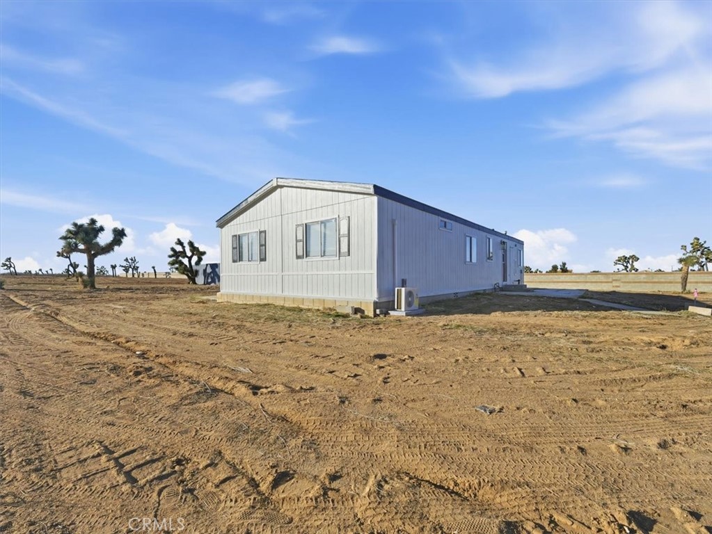 11878 Pacific Road Phelan, CA 92371 - Photo 44 of 50 a view of a house with backyard