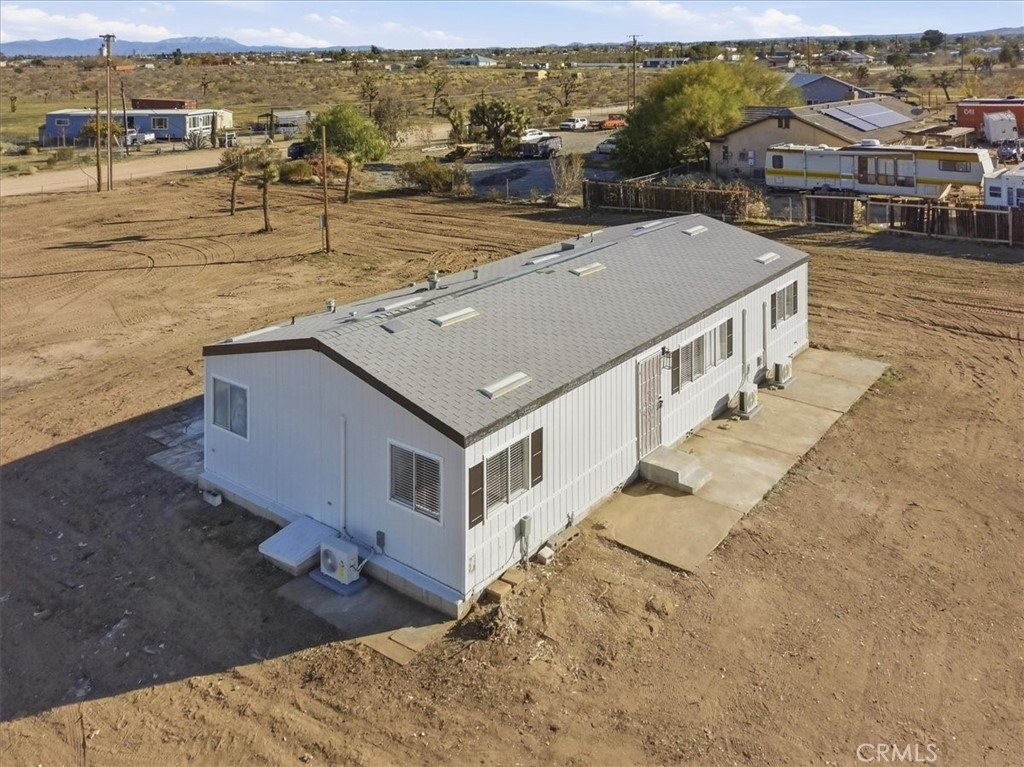 11878 Pacific Road Phelan, CA 92371 - Photo 45 of 50 a view of a terrace with wooden floor and ocean view