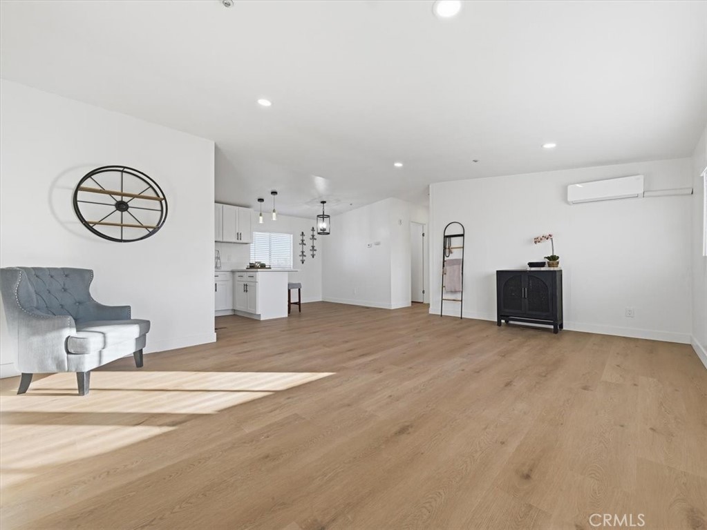 11878 Pacific Road Phelan, CA 92371 - Photo 6 of 50 a view of a hallway with seating area