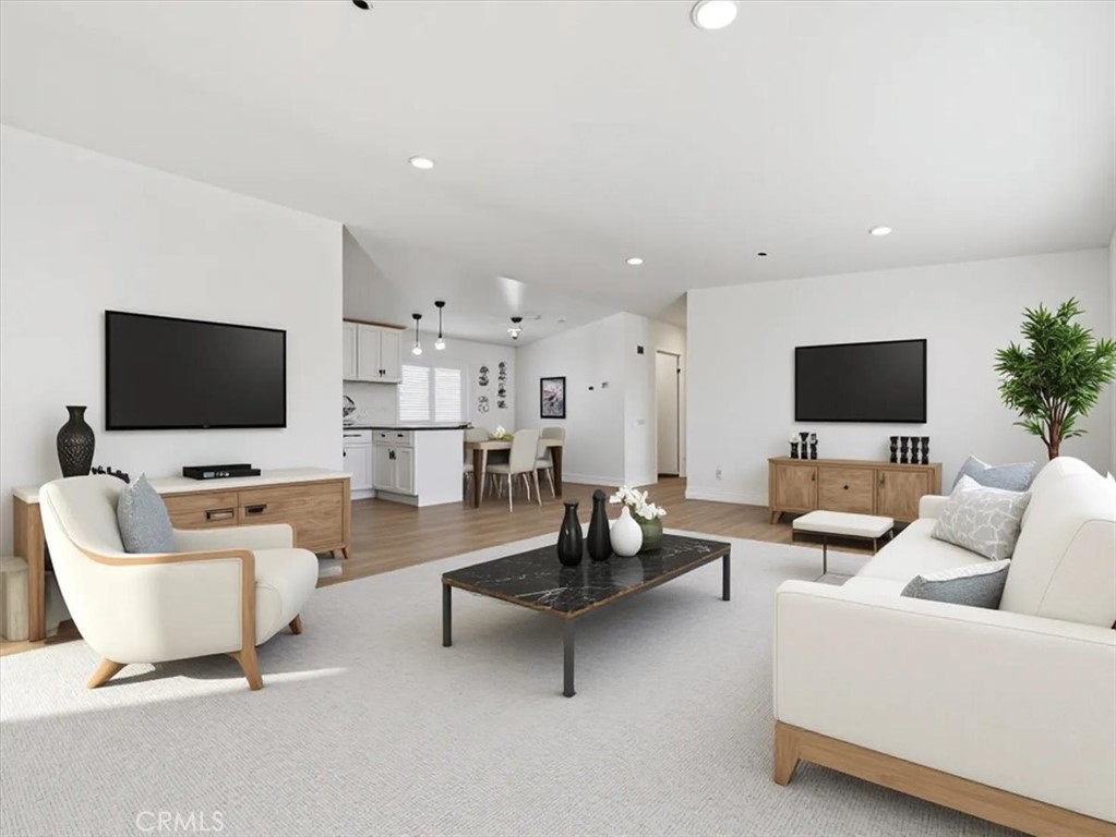 11878 Pacific Road Phelan, CA 92371 - Photo 7 of 50 a living room with furniture and a flat screen tv