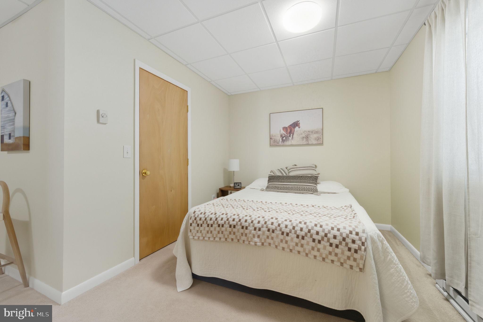 20949 Johnson Road Lincoln, DE 19960 - Photo 13 of 33 a bedroom with a bed and a window