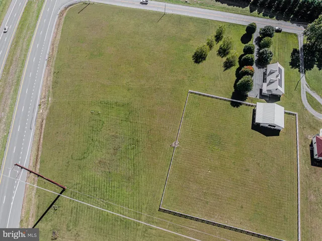 a view of swimming pool with an outdoor seating
