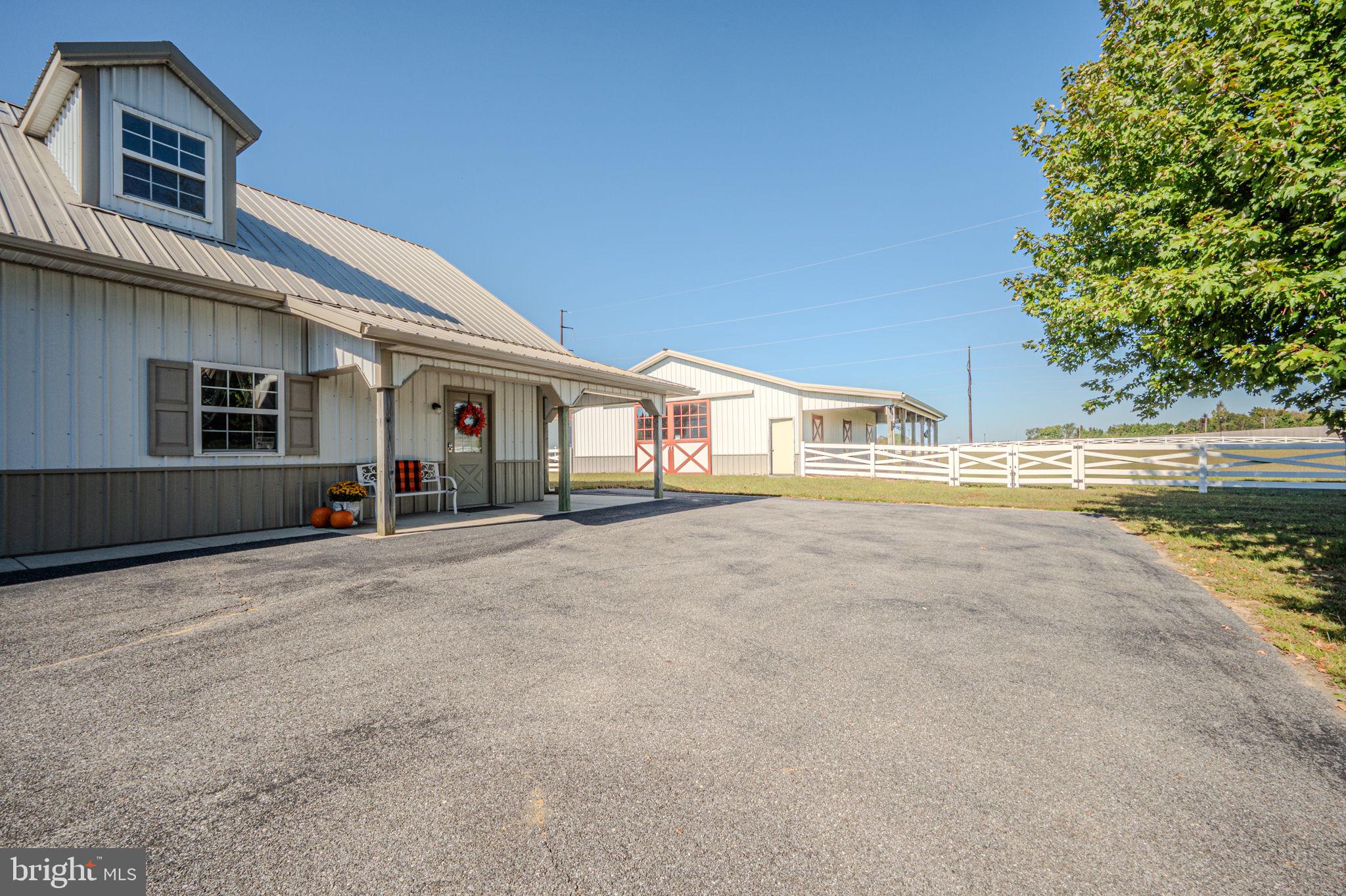 20949 Johnson Road Lincoln, DE 19960 - Photo 26 of 33 a view of swimming pool with an outdoor seating