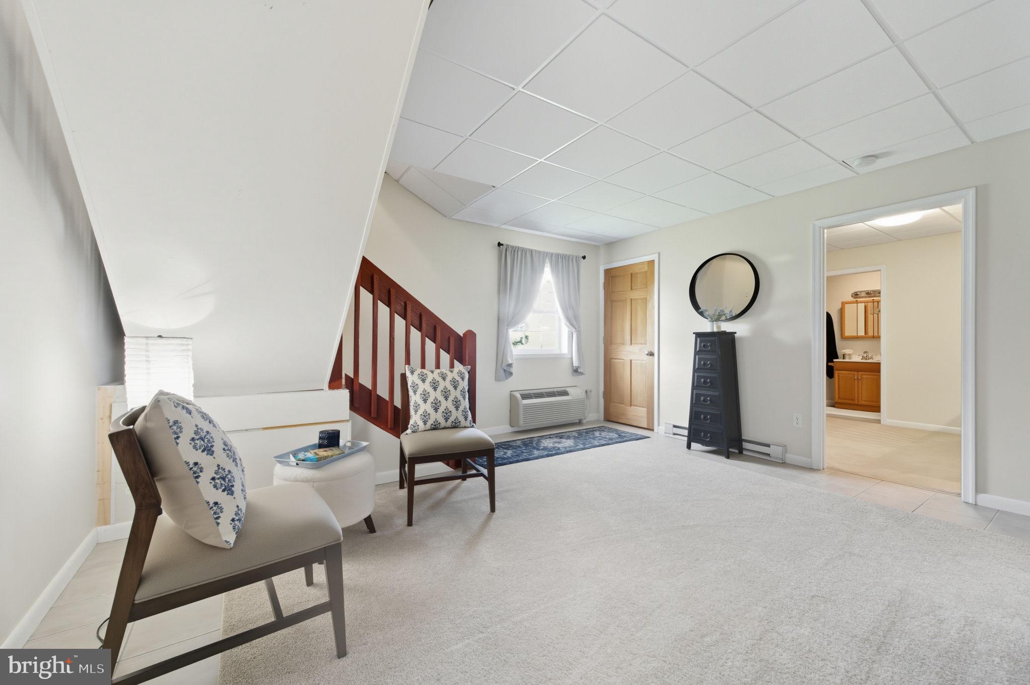 20949 Johnson Road Lincoln, DE 19960 - Photo 7 of 33 a view of a livingroom with furniture and a window