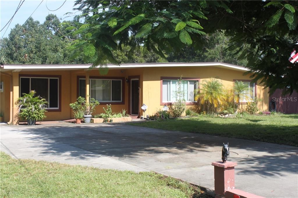 8304 Reveille Road Orlando, FL 32809 - Photo 1 of 1 Front of home