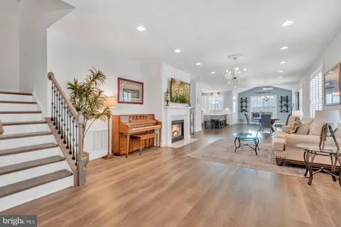 a large white dining space with furniture
