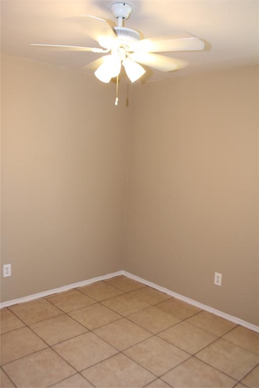 2136 Coelum Court Dallas, TX 75253 - Photo 11 of 29 en empty room with fan
