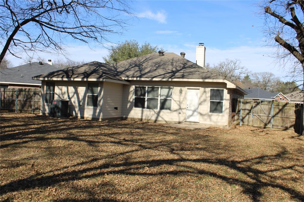 2136 Coelum Court Dallas, TX 75253 - Photo 2 of 29 a front view of a house with a garden