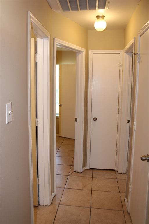 2136 Coelum Court Dallas, TX 75253 - Photo 9 of 29 a view of a livingroom with a chandelier