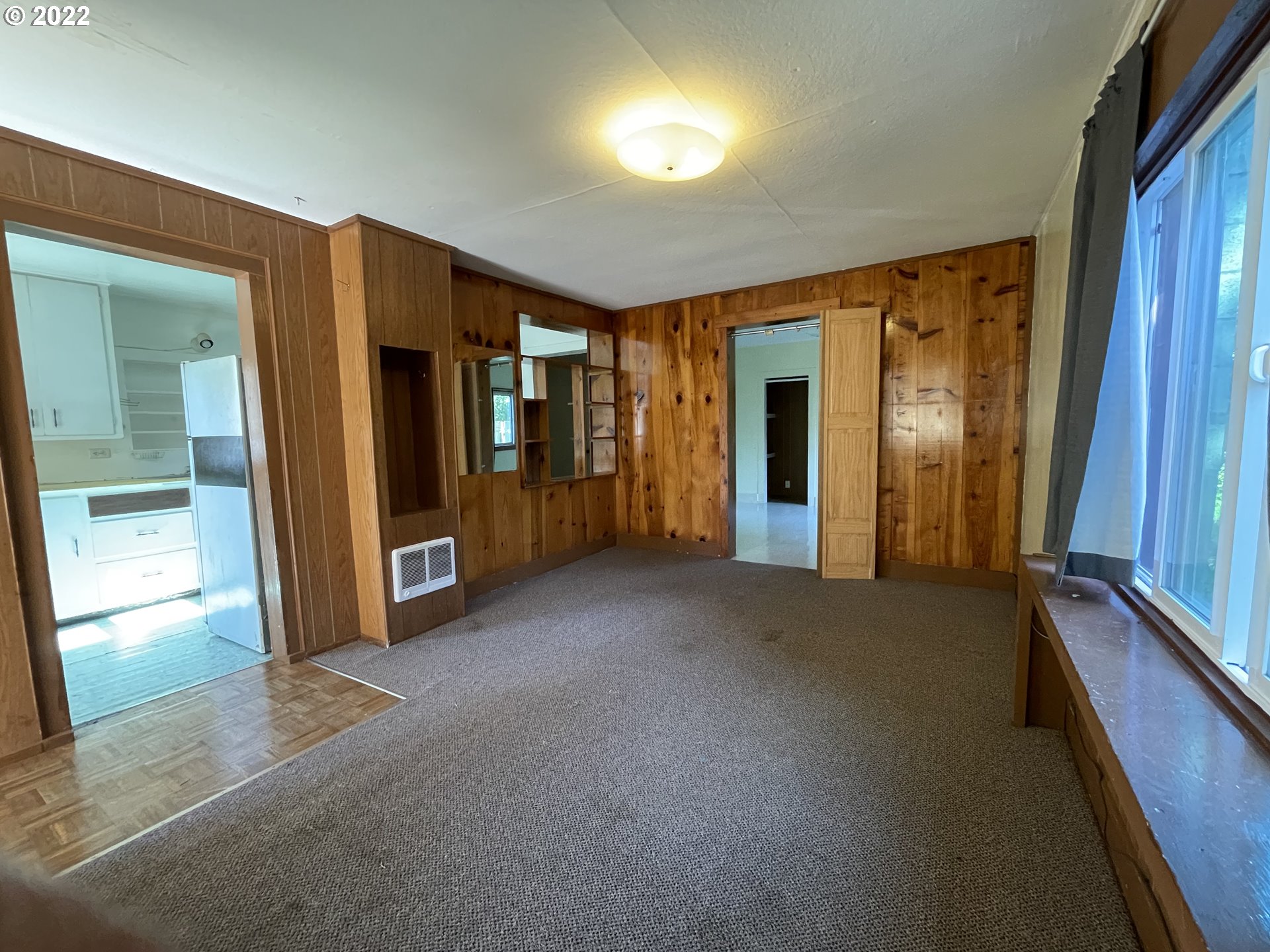 443 South 34th Street Springfield, OR 97478 - Photo 7 of 13 an empty room with closet and windows