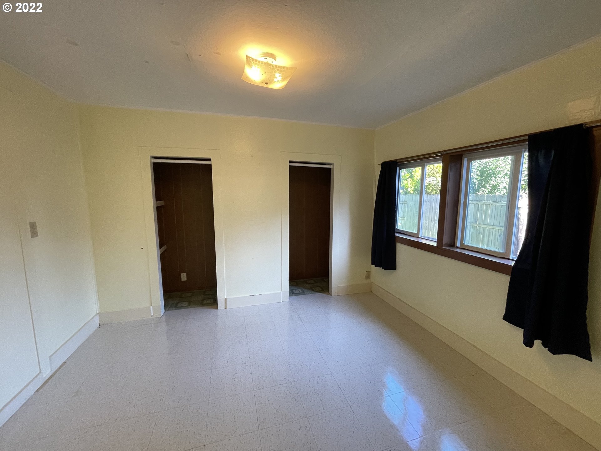 443 South 34th Street Springfield, OR 97478 - Photo 10 of 13 an empty room with windows and closet