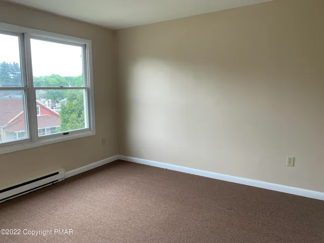 an empty room with a window