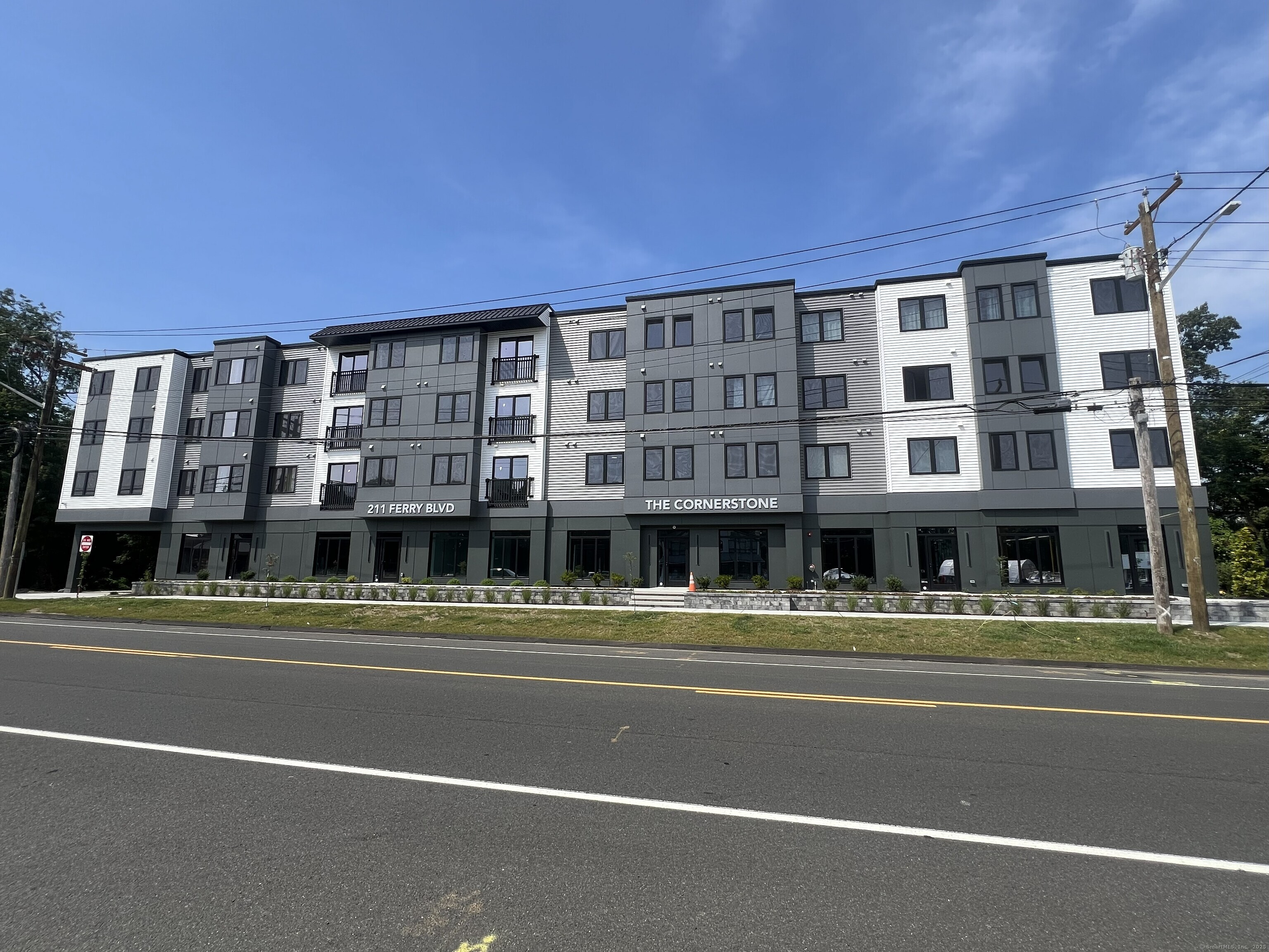 211 Ferry Boulevard, Unit 203 Stratford, CT 06615 - Photo 1 of 16 a view of city with tall buildings