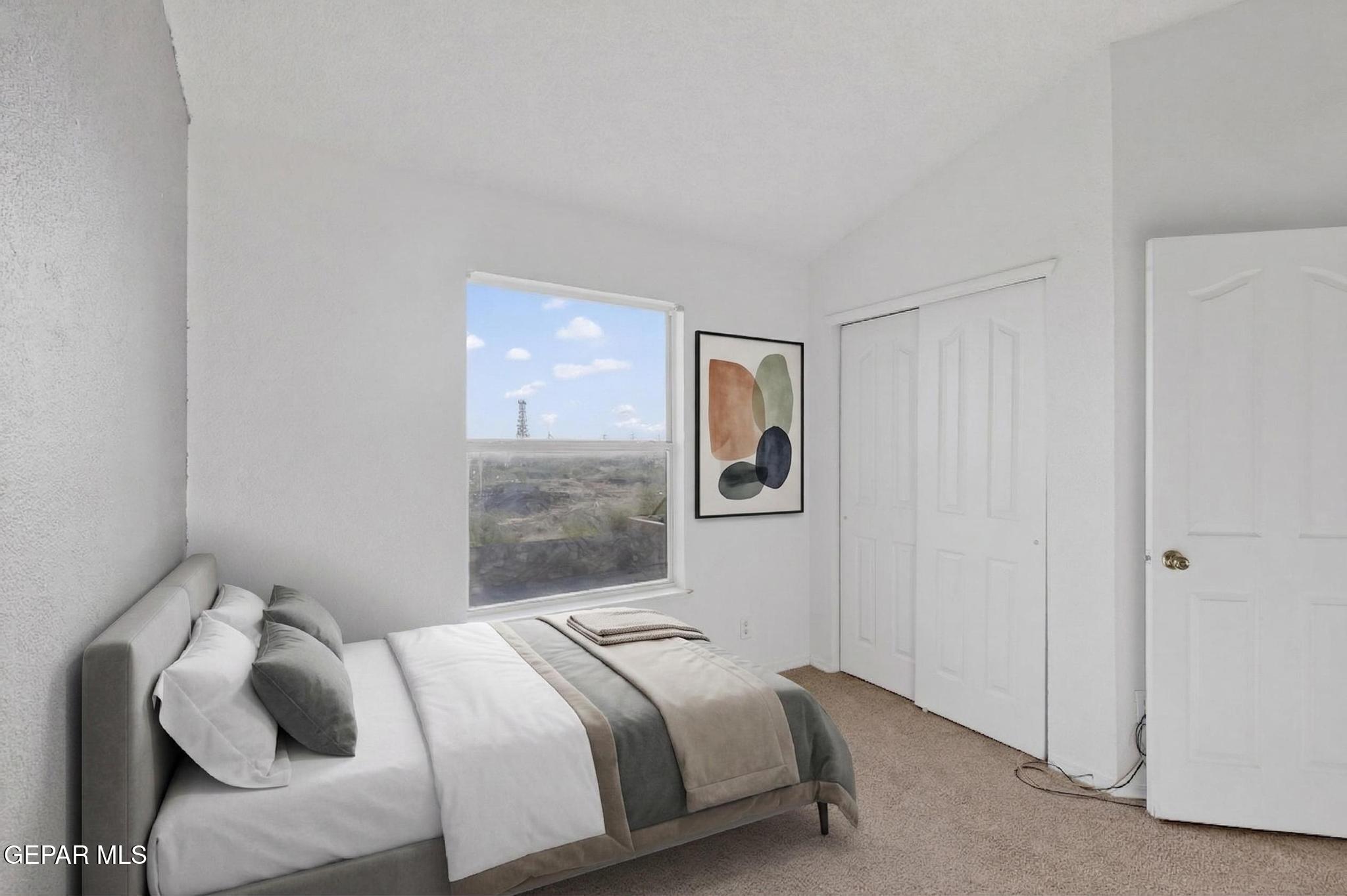 3626 Dominican Street El Paso, TX 79936 - Photo 17 of 20 a bedroom with a bed and a window