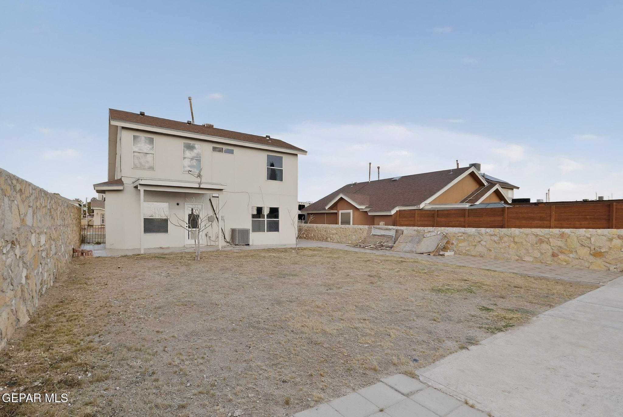 3626 Dominican Street El Paso, TX 79936 - Photo 18 of 20 a view of a house with a yard