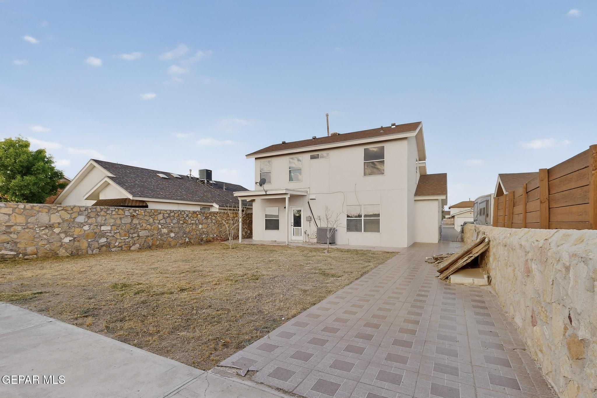 3626 Dominican Street El Paso, TX 79936 - Photo 19 of 20 a view of house with backyard and parking