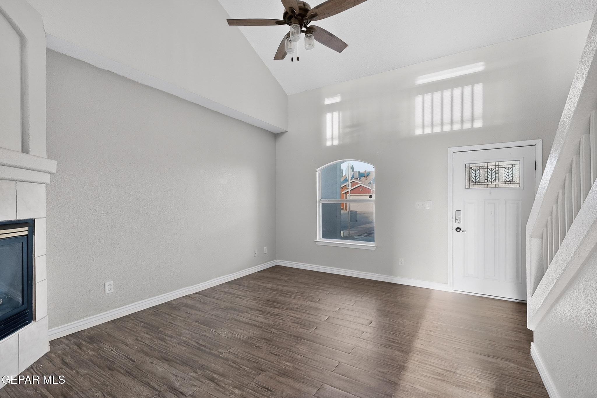 3626 Dominican Street El Paso, TX 79936 - Photo 4 of 20 wooden floor in an empty room with a window