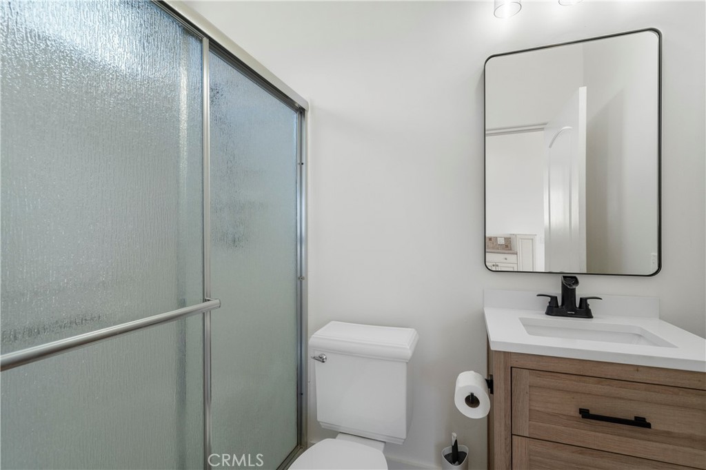 37700 Calle De Lobo Murrieta, CA 92562 - Photo 2 of 7 a bathroom with a sink a toilet and shower