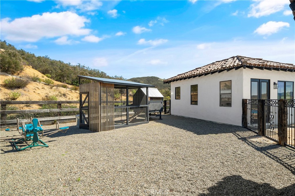 37700 Calle De Lobo Murrieta, CA 92562 - Photo 3 of 7 a view of a house with a patio