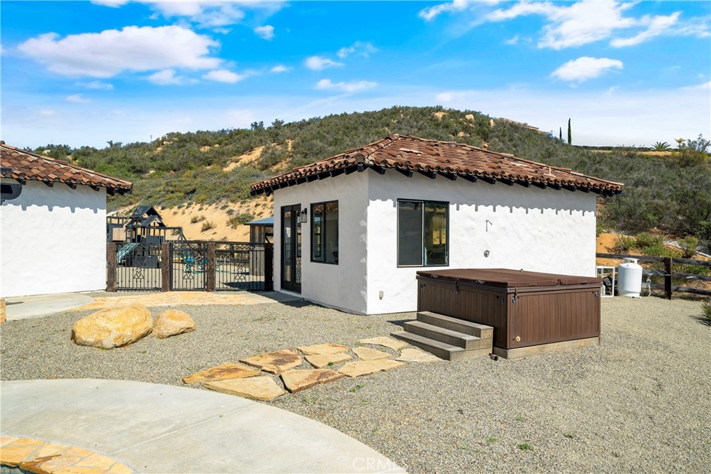 37700 Calle De Lobo Murrieta, CA 92562 - Photo 4 of 7 a front view of a house with a yard