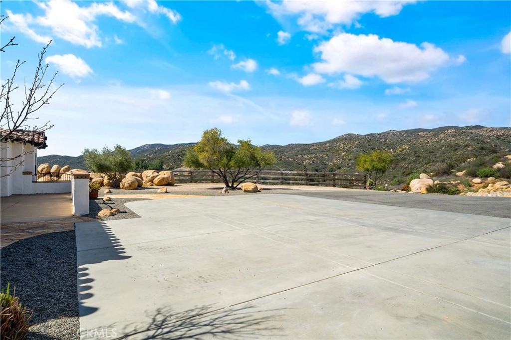 37700 Calle De Lobo Murrieta, CA 92562 - Photo 7 of 7 a view of swimming pool and mountain view