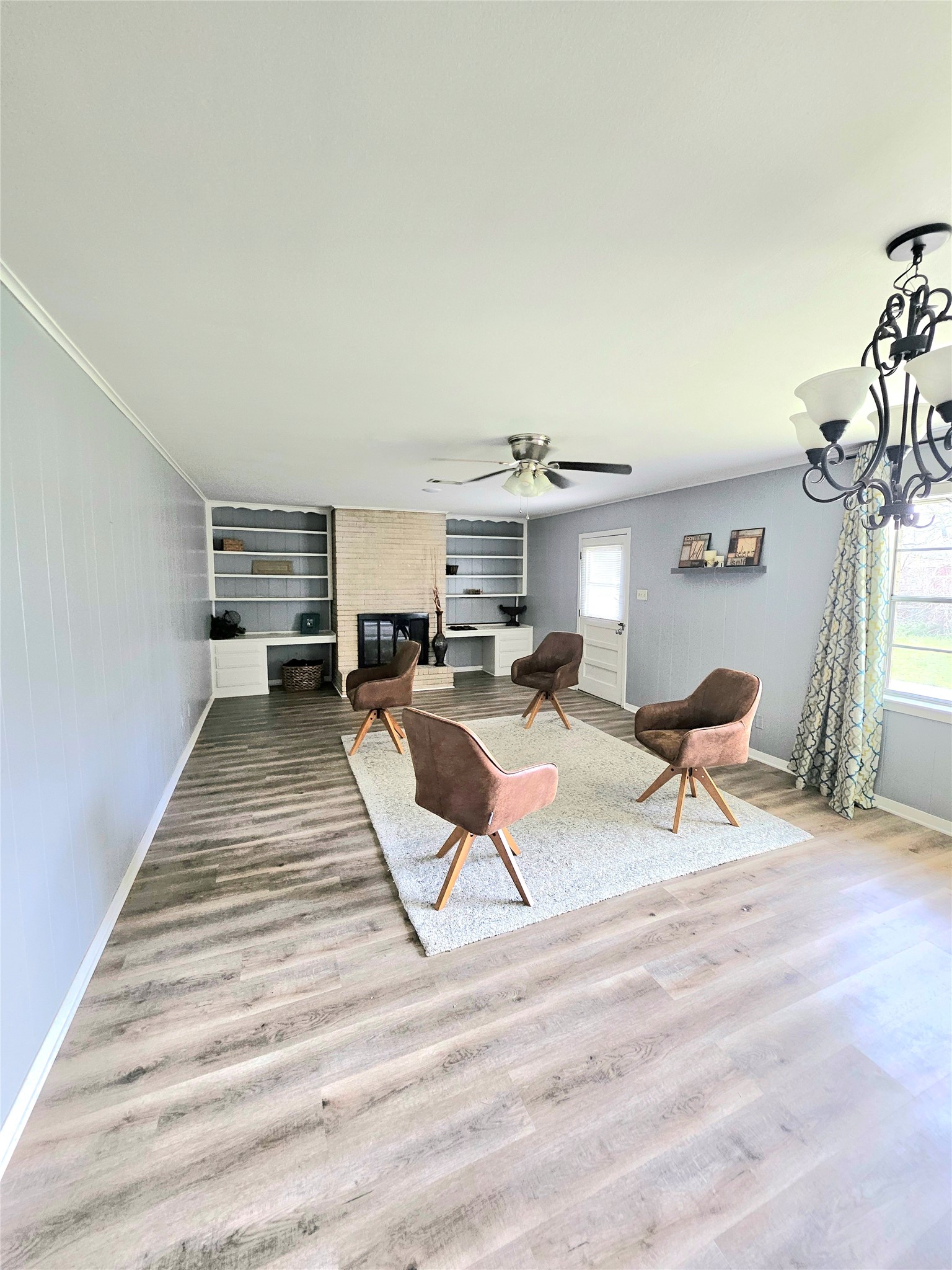 101 Summit Drive Conroe, TX 77303 - Photo 9 of 24 a living room with furniture and a table