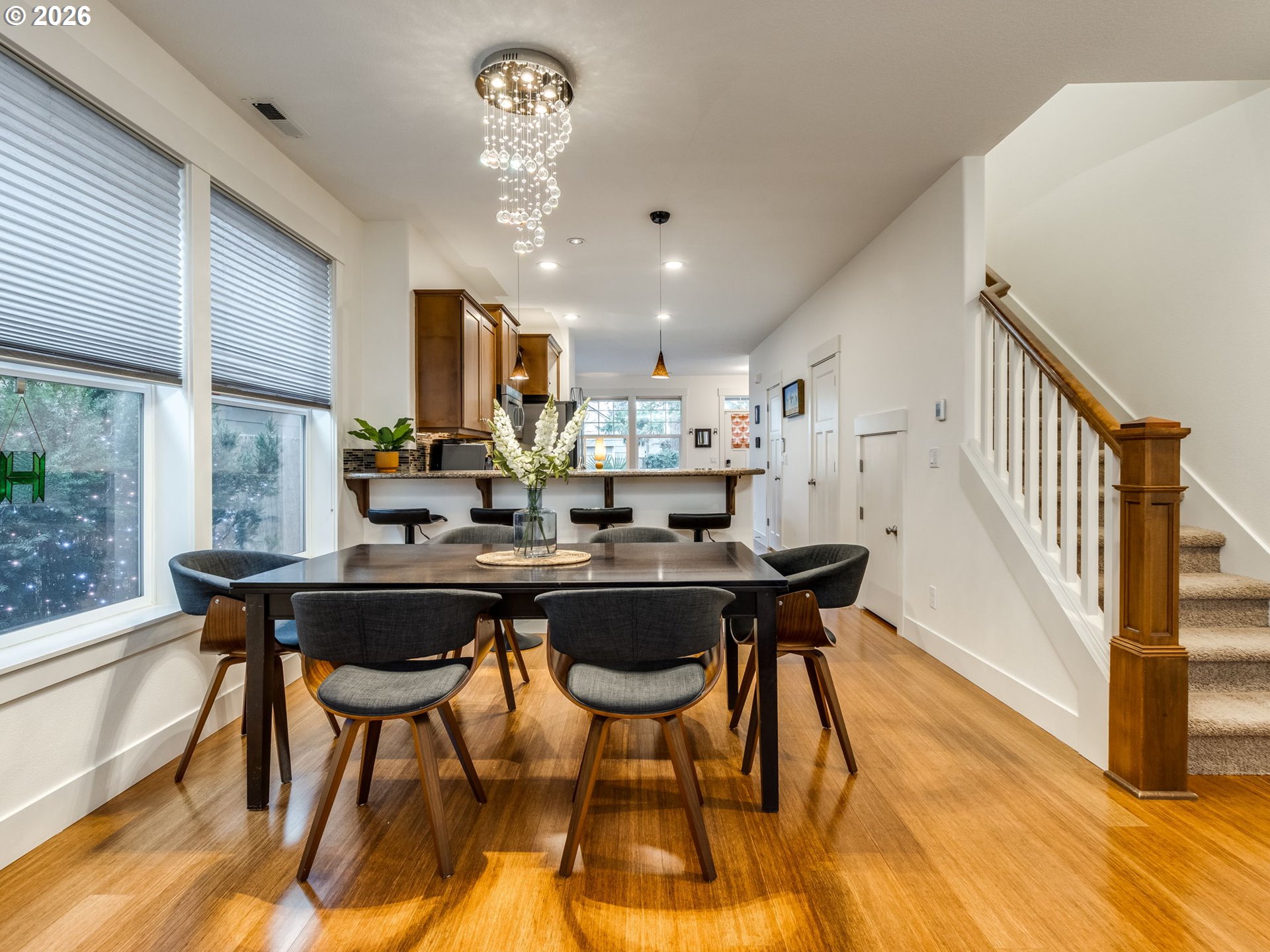 5619 Southeast Carlton Street Portland, OR 97206 - Photo 11 of 30 a view of a dining room with furniture window and wooden floor