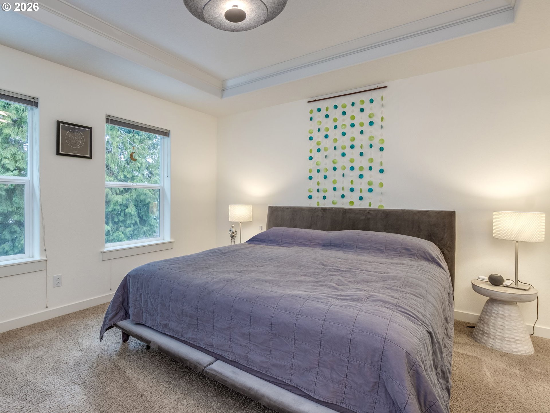 5619 Southeast Carlton Street Portland, OR 97206 - Photo 15 of 30 a bedroom with a bed and a large window