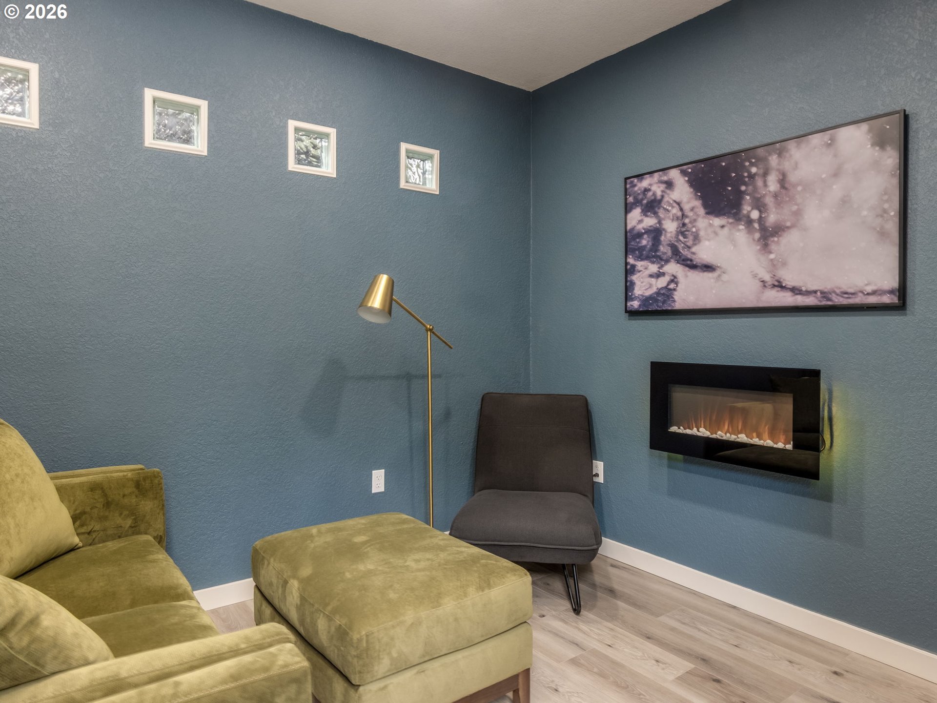 5619 Southeast Carlton Street Portland, OR 97206 - Photo 19 of 30 a living room with furniture and a couch