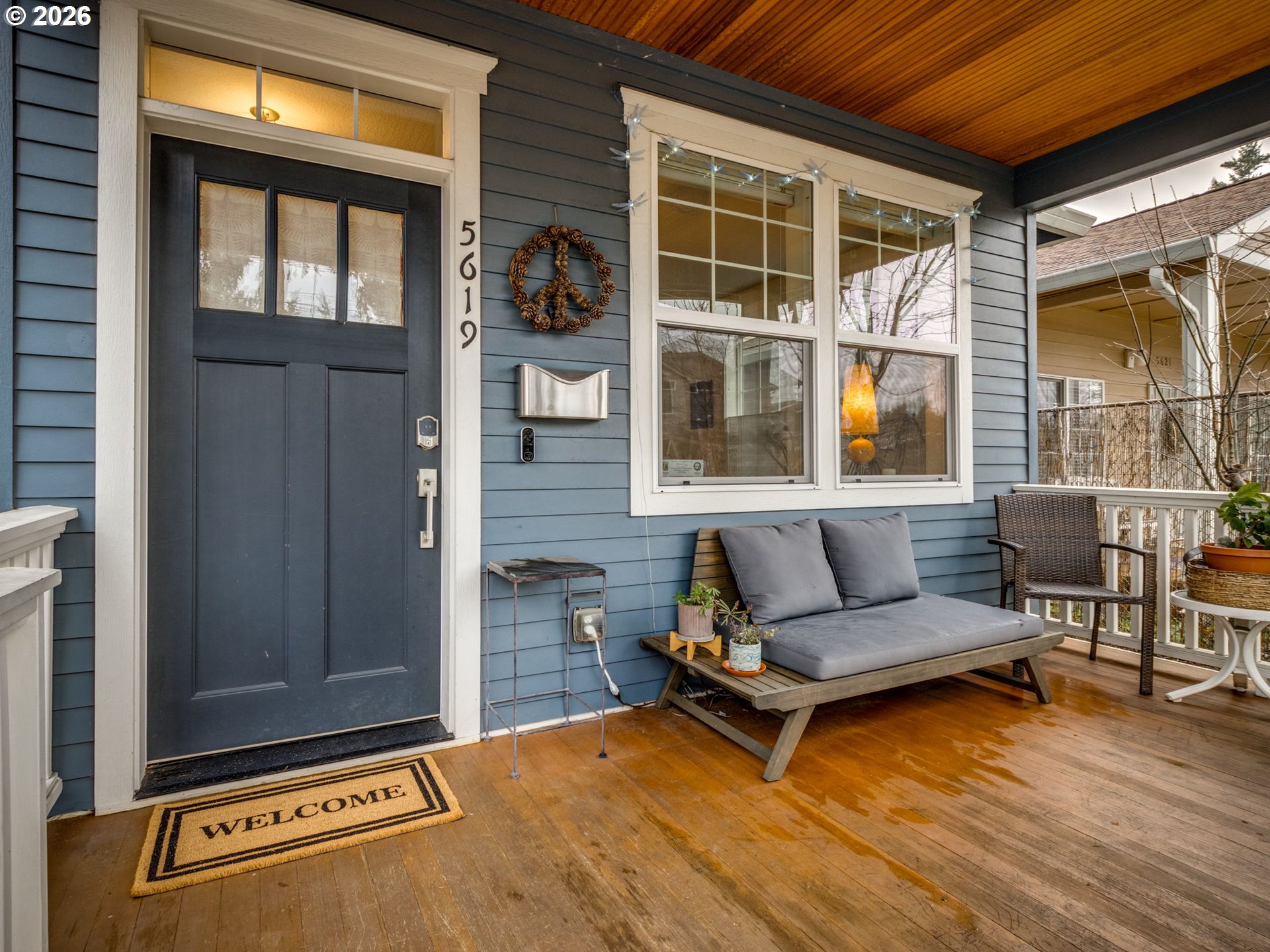 5619 Southeast Carlton Street Portland, OR 97206 - Photo 2 of 30 a view of a livingroom with furniture and door