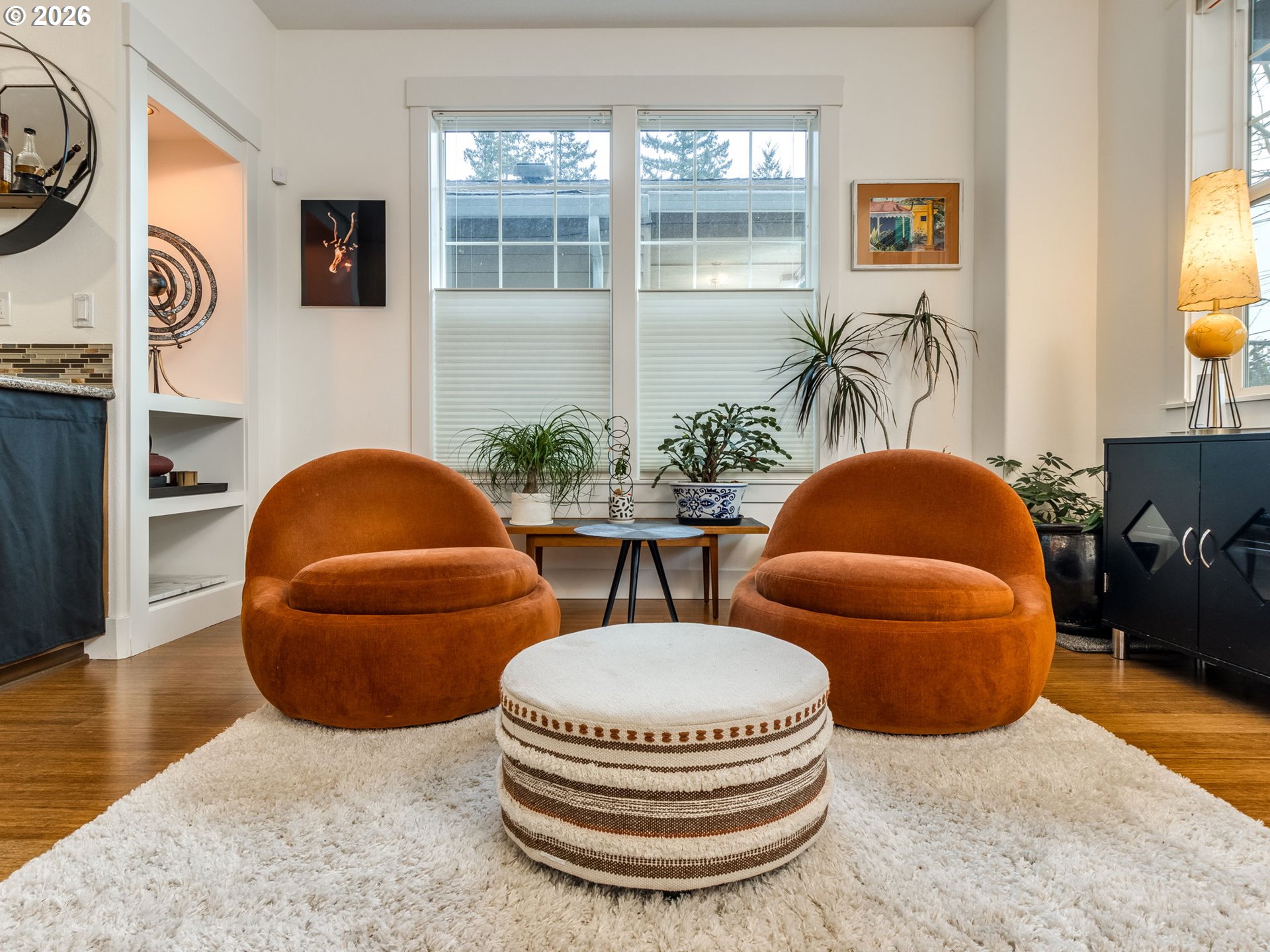 5619 Southeast Carlton Street Portland, OR 97206 - Photo 4 of 30 a living room with furniture and a potted plant